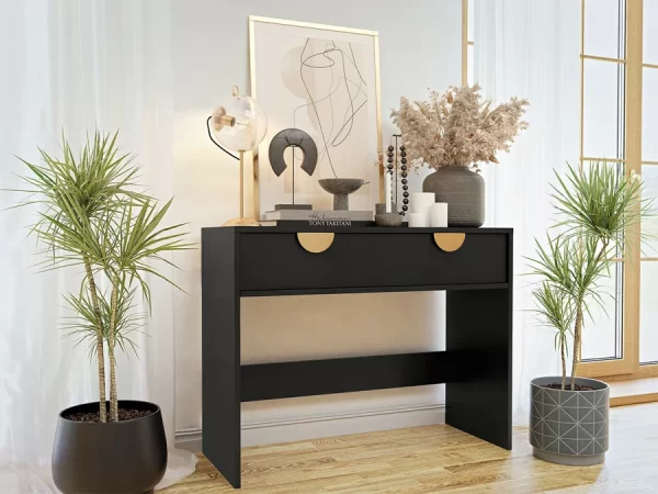 La mesa consola moderna en color negro es la opción perfecta para quienes buscan un mueble que combine estilo y funcionalidad. Con su diseño elegante, materiales de alta calidad y un amplio cajon con 2 divisiones aprovecha esta oferta.