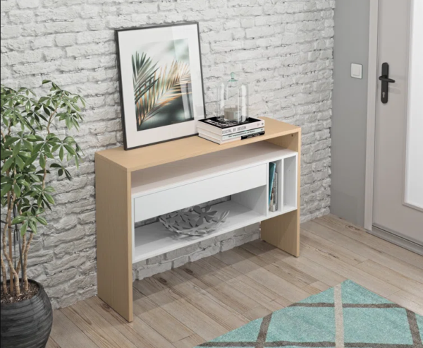 Aprovecha la oferta de nuetra mesa consola moderna en color roble y blanco es una pieza de mobiliario versátil que combina diseño contemporáneo, funcionalidad y alta calidad. Con su amplia superficie para la exposición de objetos decorativos, su cajón con correderas telescópicas y sus divisiones internas que maximizan el almacenamiento, esta consola es ideal para embellecer y organizar tu sala de estar o entrada.