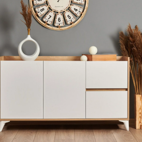 Diseño Moderno Roble-Blanco con 2 Puertas - 140x40x78cm - Elegante Almacenamiento para Comedor Construcción Robusta y Duradera: El aparador cuenta con una estructura estable fabricada en aglomerado de alta calidad, recubierto con melamina resistente al desgaste. Esta combinación asegura la durabilidad del mueble, garantizando que permanezca en excelentes condiciones durante mucho tiempo.