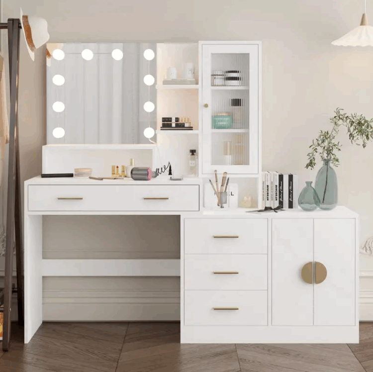Tocador Moderno con 4 cajón y 3 puerta: Elegancia y Funcionalidad en un Solo Mueble. Descubre el tocador ideal para transformar tu espacio personal con un toque de elegancia y practicidad. Este tocador con espejo, diseñado en un atractivo color blanco, no solo realza la estética de tu habitación sino que también ofrece soluciones de almacenamiento inteligentes para mantener tu entorno ordenado y accesible.