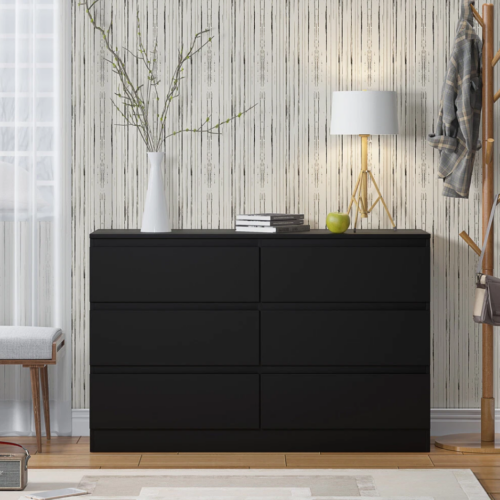 Beneficios y Cualidades de una Cómoda con 6 Amplios Cajones Color  Negro sin Tiradores Descubre la perfecta combinación de estilo moderno y funcionalidad con nuestra cómoda de 6 amplios cajones, fabricada en melamina de 18 mm y diseñada en un elegante color Negro. Esta cómoda no solo transforma cualquier espacio con su apariencia minimalista y sofisticada, sino que también ofrece una solución de almacenamiento práctica y duradera.