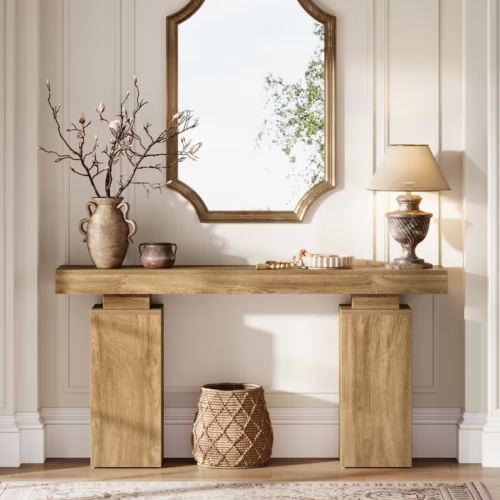 Mesa Recibidor Moderna en Roble: Elegancia y Funcionalidad para tu Hogar Transforma tu espacio con la mesa consola moderna en color roble, una pieza de mobiliario que combina estilo, funcionalidad y calidad. Esta mesa consola no solo sirve como un atractivo elemento decorativo, sino que también ofrece un espacio de almacenamiento práctico. Confeccionada en melamina de alta calidad de 18 mm, garantiza durabilidad y resistencia. Las medidas de este elegante mueble son 84 cm de alto, 160 cm de ancho y 30 cm de profundidad, ideales para embellecer y organizar cualquier área de tu hogar.