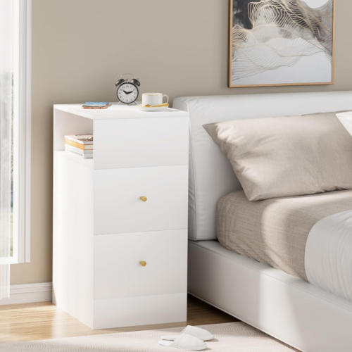 Mesita de Noche Moderna con 2 Amplios Cajones en Blanco : La Combinación Perfecta de Estilo, Almacenamiento y Funcionalidad La mesa de noche moderna en color blanco mate es una opción ideal para quienes buscan una pieza de mobiliario elegante y funcional que complemente el diseño de su dormitorio. Este mueble no solo proporciona un espacio adicional para organizar tus pertenencias, sino que su diseño limpio y minimalista lo convierte en un elemento decorativo por sí mismo.