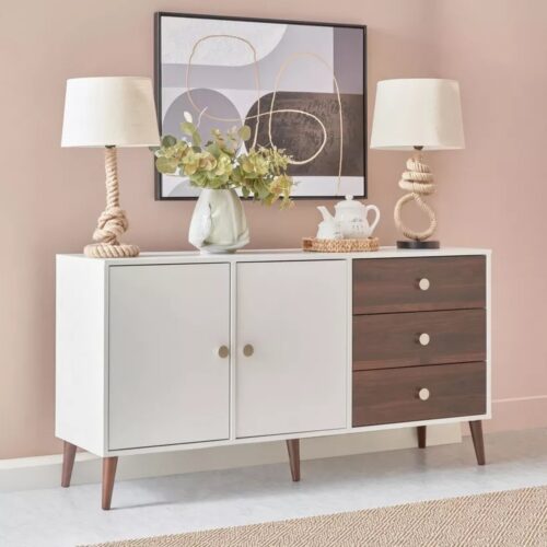 Aparador Moderno De Salon En Color Blanco Y  Gales: Elegancia y Funcionalidad en un Solo Mueble Descubre el perfecto equilibrio entre estilo y funcionalidad con nuestro aparador moderno en color blanco mate. Este mueble, con un diseño contemporáneo y líneas limpias, es ideal para organizar y embellecer cualquier espacio de tu hogar. Fabricado con melamina de alta calidad de 18 mm, ofrece durabilidad y un acabado impecable. Sus medidas de 72 cm de alto, 140 cm de ancho y 40 cm de profundidad lo convierten en la solución perfecta para combinar almacenamiento y estilo en un solo lugar. Beneficios y Cualidades 1. Diseño Moderno y Versátil: El aparador destaca por su diseño minimalista y moderno, que se adapta perfectamente a diversos estilos decorativos. Su acabado en blanco mate añade un toque de elegancia y sofisticación, creando una atmósfera luminosa y espaciosa en cualquier habitación.