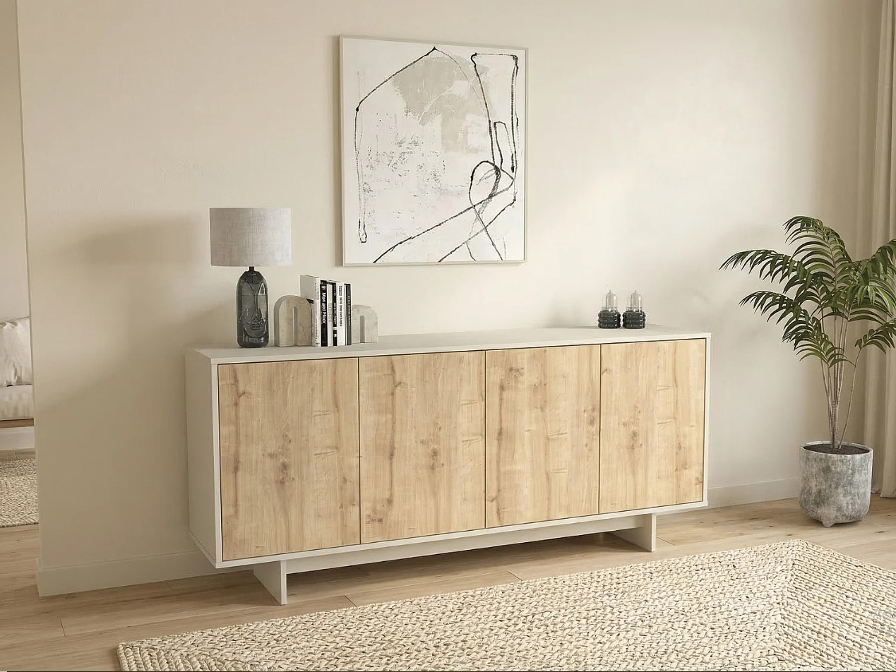 Aparador Moderno de 4 Puertas 4 Estantes Internos en Color Roble: Elegancia y Funcionalidad en un Solo Mueble Renueva tu sala con nuestro hermoso Aparador recibidor. El cual combina su estilo con la que hoy en día todos buscamos. Podrás decorarlo de una manera que tu habitación luzca extremadamente bien. Beneficios y Cualidades 1. Diseño Moderno y Versátil: Este aparador, con un diseño minimalista, será un aporte práctico y decorativo para tu hogar. Con 4 puertas, el aparador proporciona amplio espacio de almacenamiento para libros, dispositivos multimedia y otros artículos. La robusta superficie es ideal para exhibir objetos decorativos, marcos de fotos o plantas. También se puede usar como mueble bajo, armario auxiliar, etc. Gracias al tablero de gran calidad, este aparador está diseñado para durar.