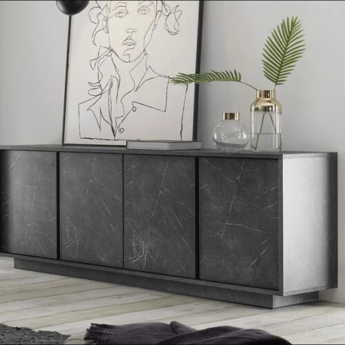Beneficios y Cualidades 1. Diseño Moderno y Versátil: Este aparador, con un diseño minimalista, será un aporte práctico y decorativo para tu hogar. Con 4  puertas, el aparador proporciona amplio espacio de almacenamiento para libros, dispositivos multimedia y otros artículos. La robusta superficie es ideal para exhibir objetos decorativos, marcos de fotos o plantas. También se puede usar como mueble bajo, armario auxiliar, etc. Gracias al tablero de gran calidad, este aparador está diseñado para durar. Módulo con 4 puertas, gran capacidad de almacenamiento. Bisagras con cierre soft. Sin tiradores. Medidas del Módulo: 180cm. de largo, 79cm. de Alto, 40cm. de Profundidad. Color onix poroso de alta calidad. Módulo con puerta y estante interior . Bisagras con cierre soft.