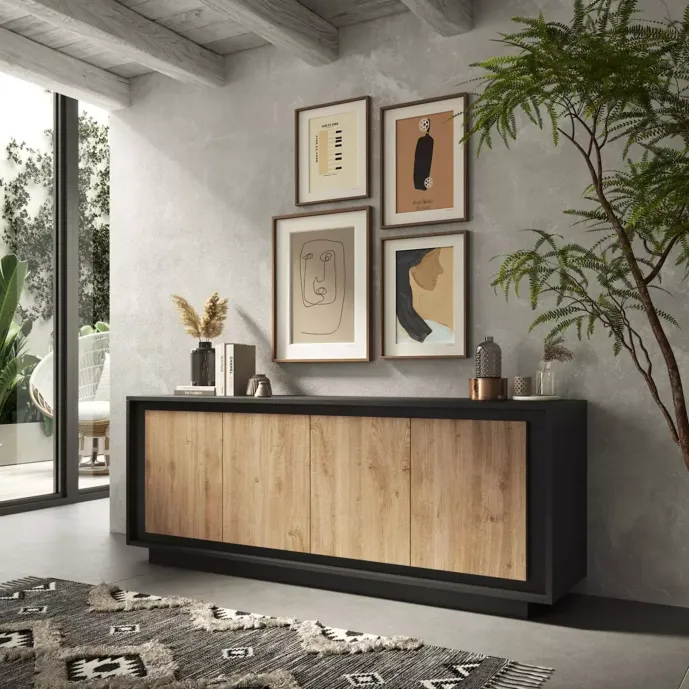 Aparador Moderno de 4 Puertas en Color Roble y Grafito: Elegancia y Funcionalidad en un Solo Mueble Renueva tu sala con nuestro hermoso Aparador recibidor. El cual combina su estilo con la que hoy en día todos buscamos. Podrás decorarlo de una manera que tu habitación luzca extremadamente bien. Beneficios y Cualidades 1. Diseño Moderno y Versátil: Este aparador, con un diseño minimalista, será un aporte práctico y decorativo para tu hogar. Con 4  puertas, el aparador proporciona amplio espacio de almacenamiento para libros, dispositivos multimedia y otros artículos. La robusta superficie es ideal para exhibir objetos decorativos, marcos de fotos o plantas. También se puede usar como mueble bajo, armario auxiliar, etc. Gracias al tablero de gran calidad, este aparador está diseñado para durar. Módulo con 4 puertas, gran capacidad de almacenamiento. Bisagras con cierre soft.  Medidas del Módulo: 205cm. de largo, 80cm. de Alto, 40cm. de Profundidad. Color grafito roble texturizado de alta calidad. Módulos con puertas y estantes interiores . Bisagras con cierre soft.