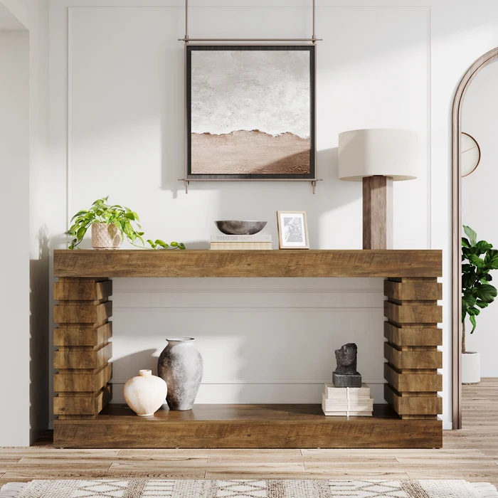 Aparador Consola Moderna Diseño Geometrico En Caramelo: Elegancia y Funcionalidad para tu Hogar Transforma tu espacio con la mesa consola moderna en color caramelo, una pieza de mobiliario que combina estilo, funcionalidad y calidad. Esta mesa consola no solo sirve como un atractivo elemento decorativo, sino que también ofrece un espacio de almacenamiento práctico. Confeccionada en melamina de alta calidad de 18 mm, garantiza durabilidad y resistencia. Las medidas de este elegante mueble son 90 cm de alto, 180 cm de ancho y 30 cm de profundidad, ideales para embellecer y organizar cualquier área de tu hogar. Beneficios y Cualidades 1. Diseño Moderno y Sofisticado: La mesa consola en color caramelo destaca por su diseño contemporáneo que se adapta a diversos estilos de decoración, desde modernos hasta más clásicos. Su acabado le otorga una calidez natural que crea un ambiente acogedor en cualquier estancia. 2. Funcionalidad Óptima: El diseño de esta mesa consola perfecto para almacenar y exhibir tus objetos decorativos favoritos, libros, o incluso artículos de uso diario. Este mueble no solo embellece tu hogar, sino que también maximiza el espacio disponible, manteniendo todo ordenado y accesible. 3. Compacta y Versátil: Con unas dimensiones de 90 cm de alto, 180 cm de ancho y 30 cm de profundidad, esta mesa consola es perfecta para espacios pequeños o medianos, como la entrada de tu hogar, el salón o el pasillo. Su tamaño compacto permite integrarla fácilmente en cualquier habitación, ofreciendo un toque de elegancia sin ocupar demasiado espacio.