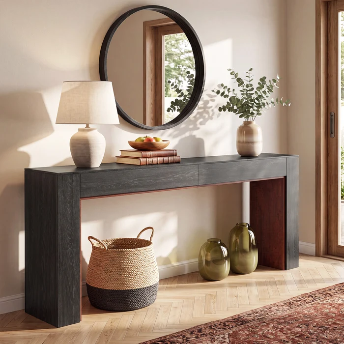 Mesa Consola Moderna en Roble: Elegancia y Funcionalidad para tu Hogar Transforma tu espacio con la mesa consola moderna en color roble, una pieza de mobiliario que combina estilo, funcionalidad y calidad. Esta mesa consola no solo sirve como un atractivo elemento decorativo, sino que también ofrece un espacio de almacenamiento práctico. Confeccionada en melamina de alta calidad de 18 mm, garantiza durabilidad y resistencia. Las medidas de este elegante mueble son 85 cm de alto, 200 cm de ancho y 35 cm de profundidad, ideales para embellecer y organizar cualquier área de tu hogar. Beneficios y Cualidades 1. Diseño Moderno y Sofisticado: La mesa consola en color roble negro destaca por su diseño contemporáneo que se adapta a diversos estilos de decoración, desde modernos hasta más clásicos. Su acabado le otorga una calidez natural que crea un ambiente acogedor en cualquier estancia.
